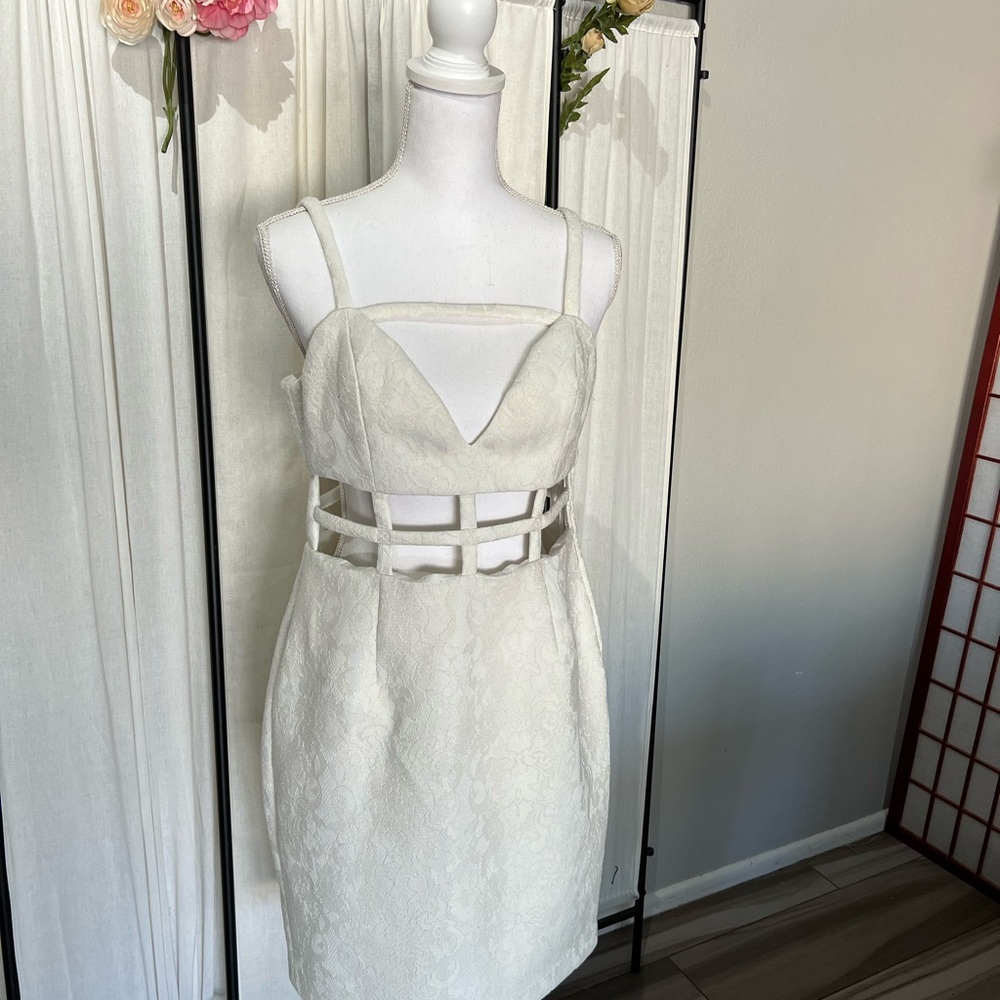 No tag was cut out. Due to its being visible. Cute sexy style size 10
